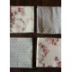 Un lot de 4 serviettes de table gris bleu Pois Fleurs roses