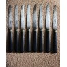 Un lot de 8 petits couteaux viroles bois noir