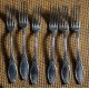 Un lot de 6 fourchettes métal argenté décor Feuillage