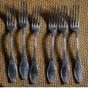 Un lot de 6 fourchettes métal argenté décor Feuillage
