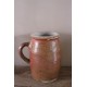 Pot en terre cuite anse rondeur vase