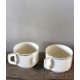 Un lot de deux tasses écru dorure Sarreguemines
